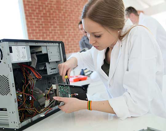 woman-fixing-computer-for-service