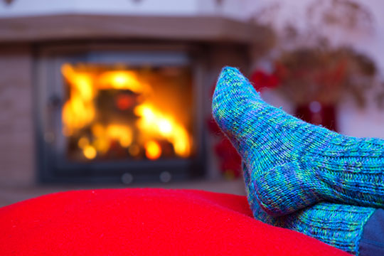 Relax by the fire on your holiday vacation.