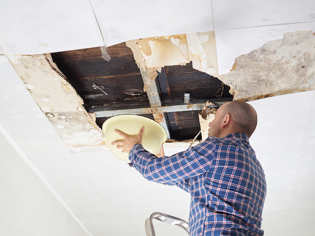 A landlord tries to fix a leaking roof in his rental property