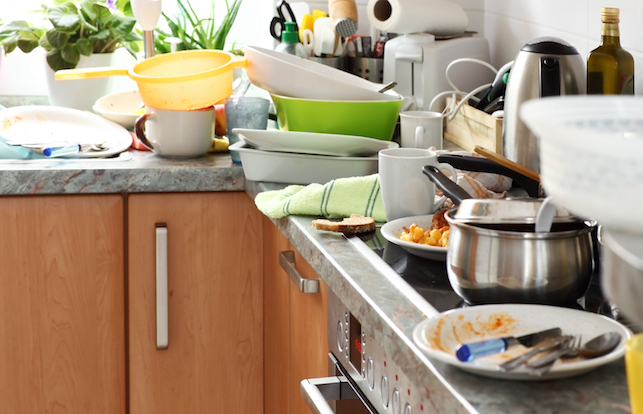 Pile of dirty dishes in the kitchen