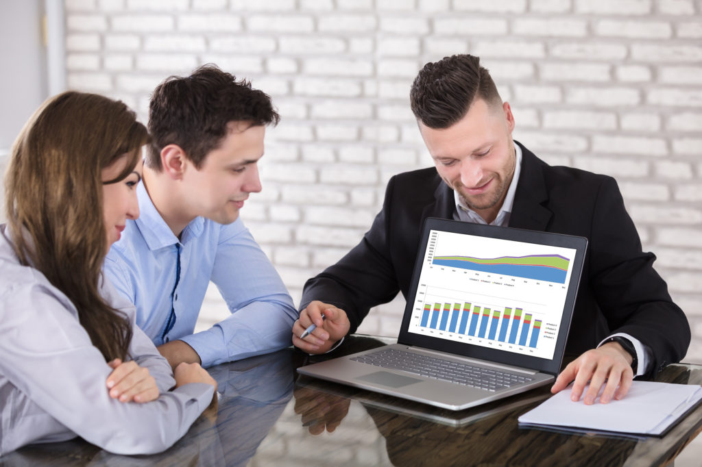 A couple meeting with a financial advisor