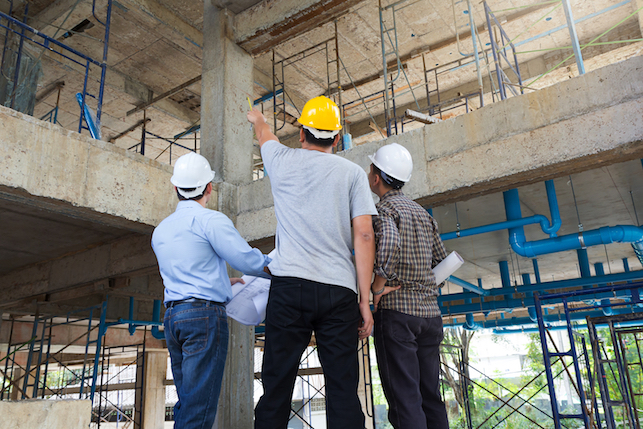Construction workers at their job site