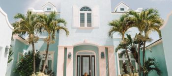 woman in front of house