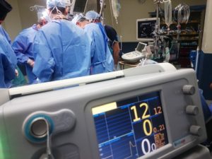 doctors reviewing patient's living will before administering life-sustaining treatment