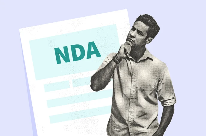 Person standing before an NDA and pondering whether they should sign it