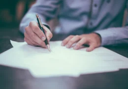 person writing a will