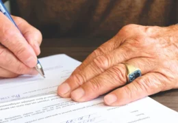 person signing different types of power of attorney forms