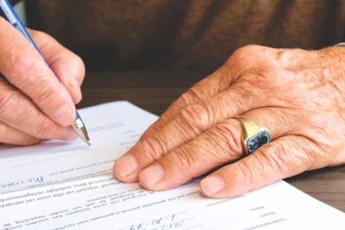 person signing different types of power of attorney forms