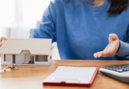 Realtor Selling a Model House