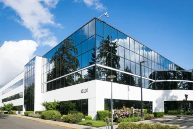 image of a commercial building with windows on a sunny day