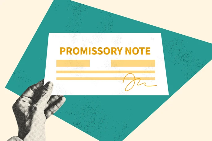 Person holding a promissory note and educating themselves on how to sell a promissory note