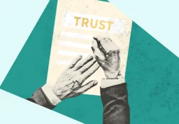 Person writing a trust and reviewing how to set up a trust, including the costs involved