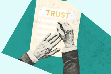 Person writing a trust and reviewing how to set up a trust, including the costs involved