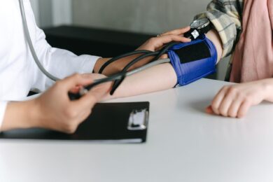 Patient measuring blood pressure