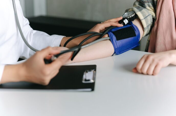 Patient measuring blood pressure