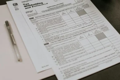 Tax Form 1040 with a pen