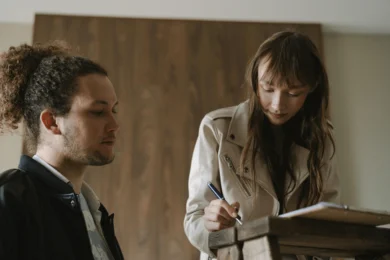 Landlord reviewing a document with a tenant