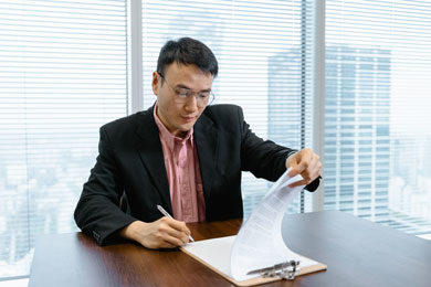 an actuary reviews a legal document
